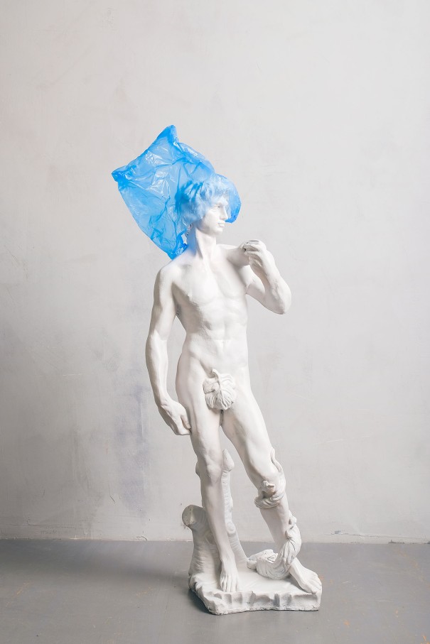 white-nude-sculpture-covered-blue-plastic-on-head-3683191